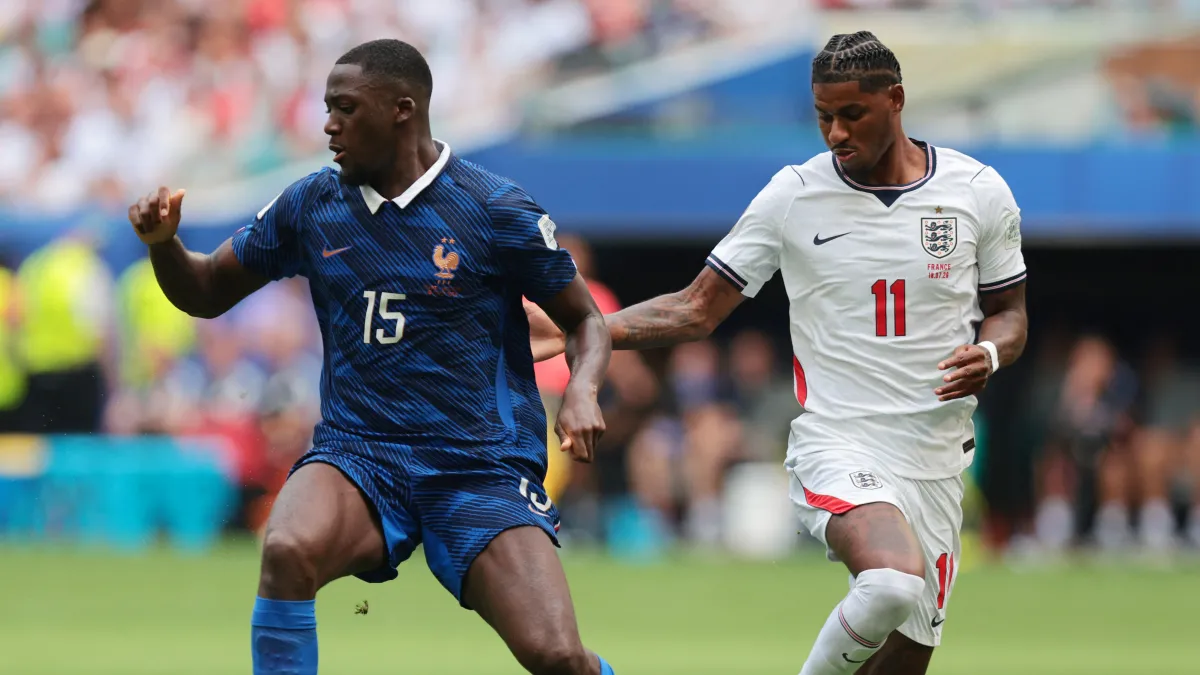 France's Ibrahima Konate in action with England's Marcus Rashford 071826